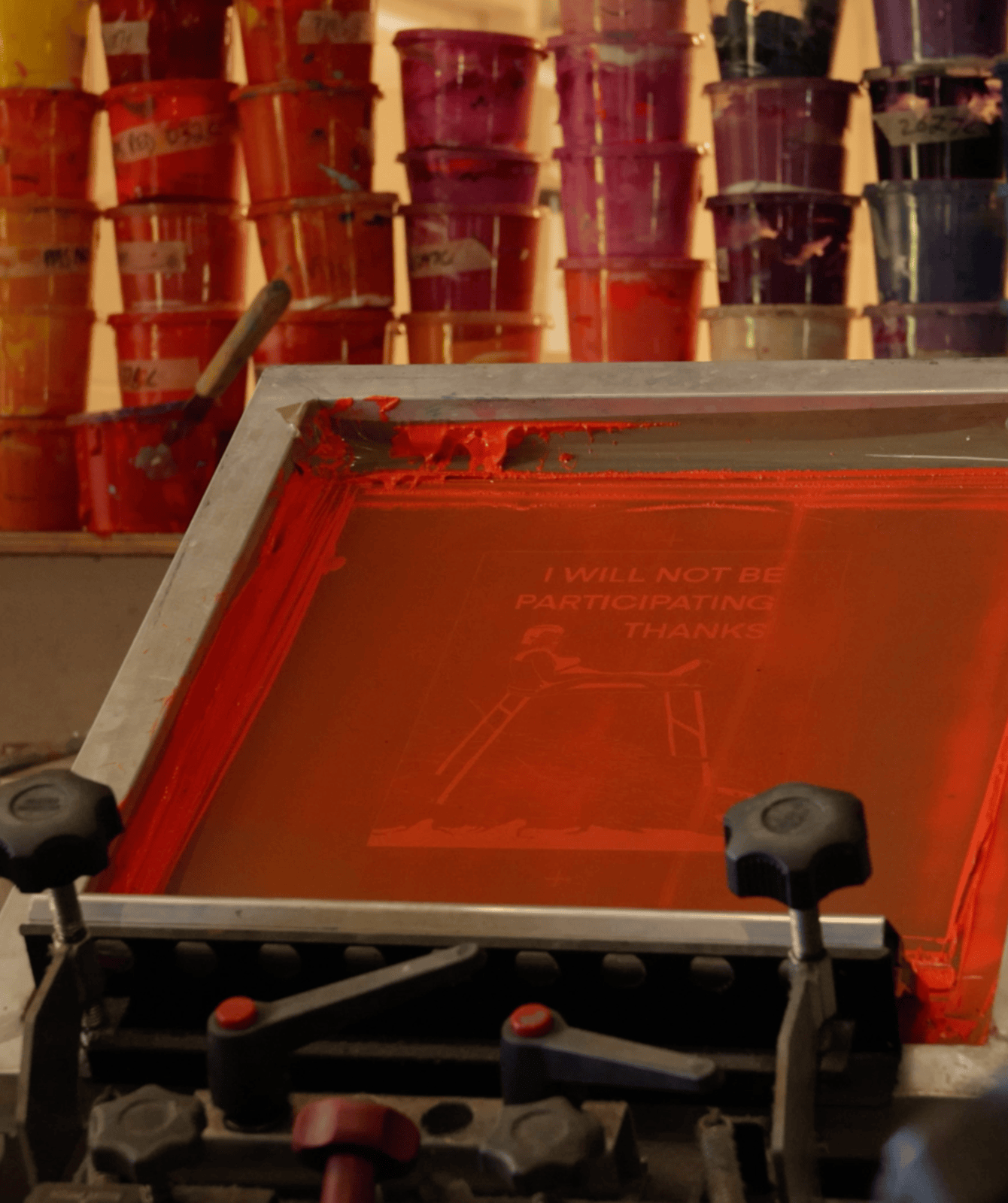 Filthyratbag T-shirt being screen-printed at Heavypress