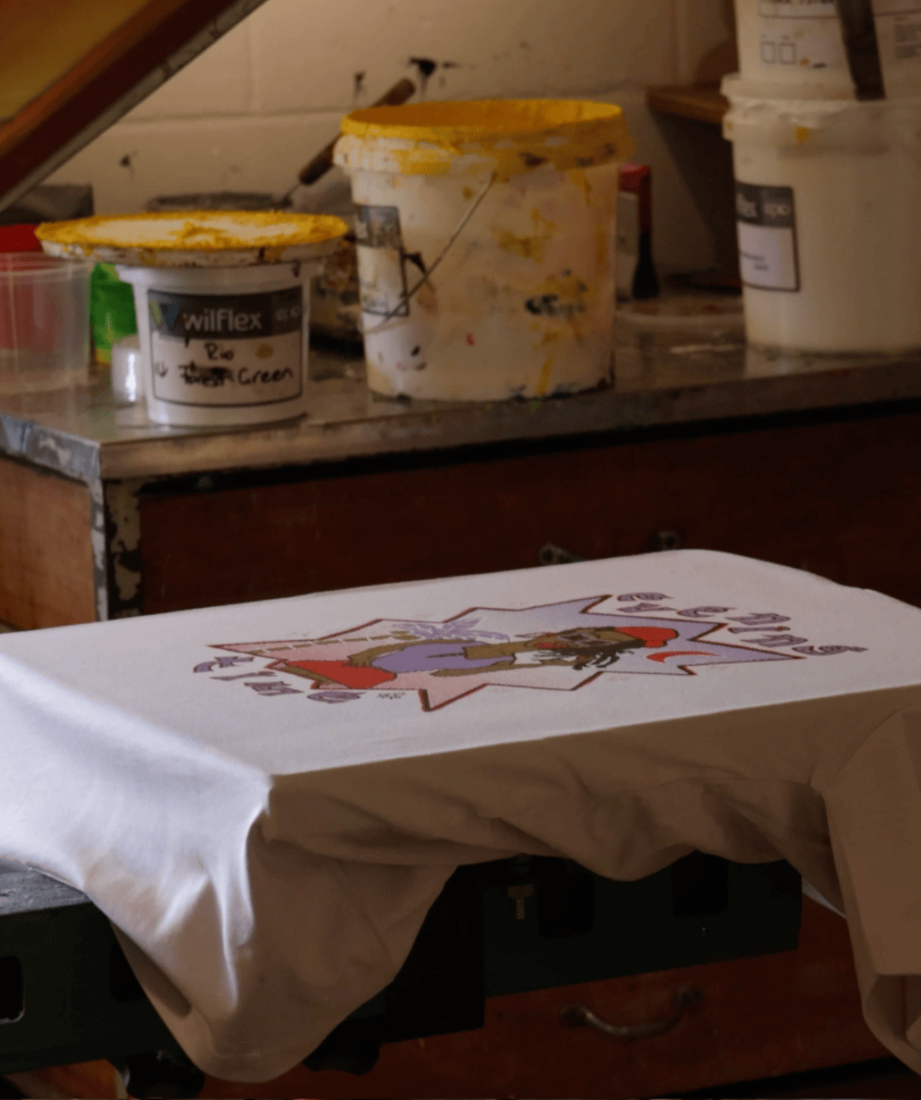 Olana Janfa T-shirt being screen-printed at Heavypress